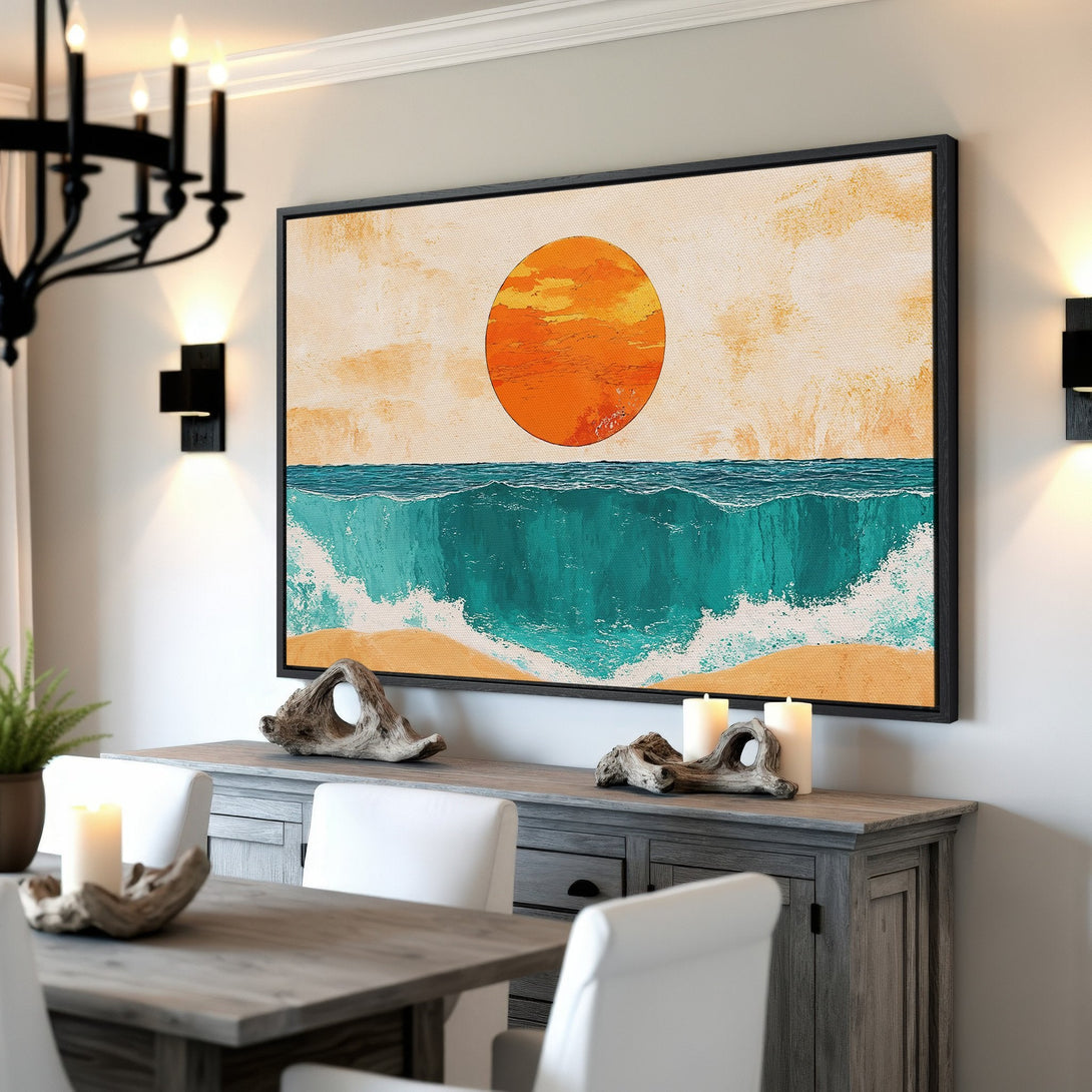 Framed Wall Art: Coastal sunset canvas print in a dining room. Features a vibrant orange, teal, and beige color palette. Perfect for adding a touch of serenity.