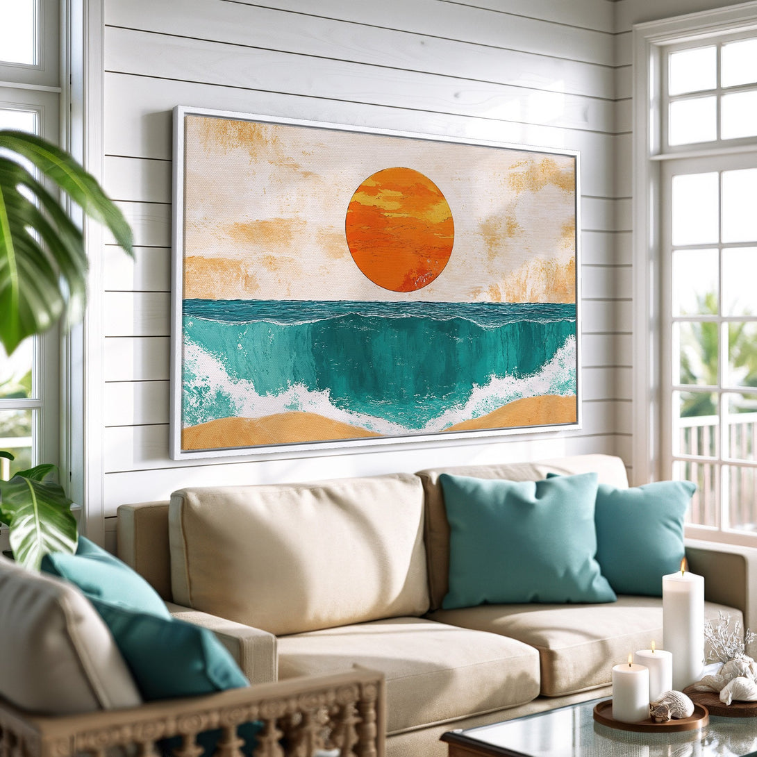 Framed Wall Art: Abstract ocean sunset painting in teal, orange, and beige. Coastal style canvas print adds a relaxing vibe to any living room.