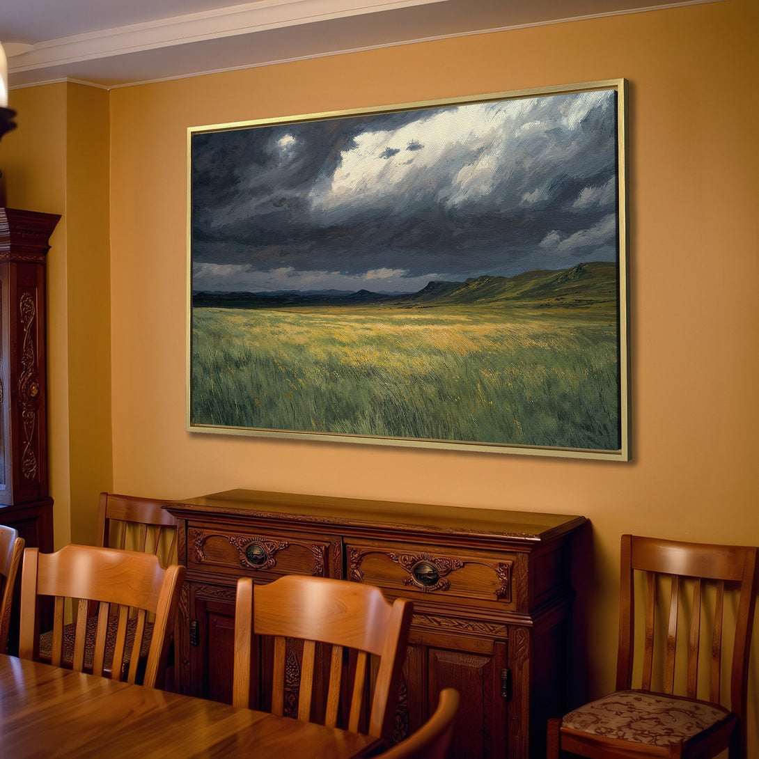 Canvas Print of a dramatic landscape painting with dark clouds and green fields. Earthy tones in a cozy living room setting.