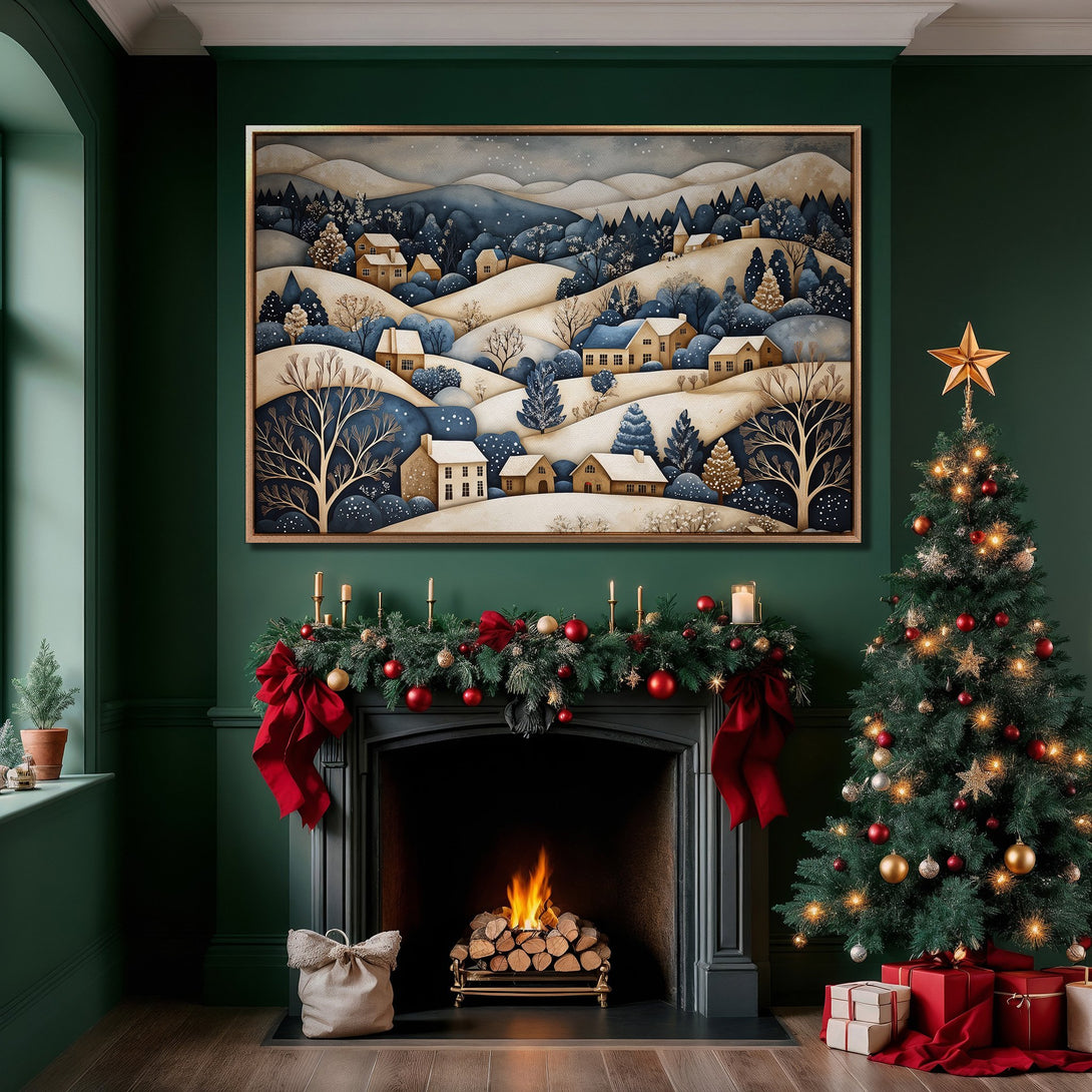 Framed Wall Art featuring a winter village scene in a watercolor style, with a blue, beige, and gold color palette, displayed in a cozy Christmas interior.