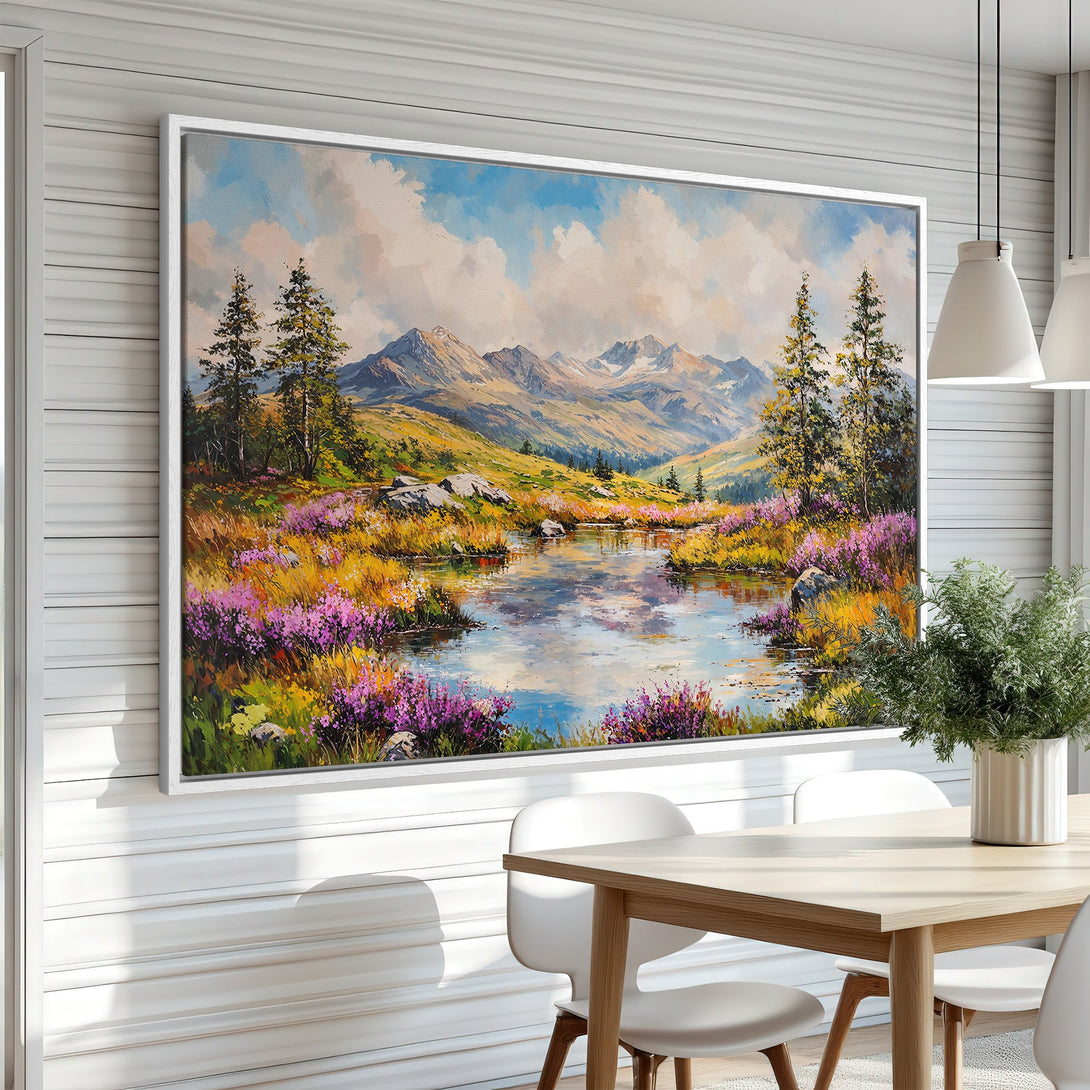 Framed Wall Art: Landscape Canvas Print. Vibrant mountain scene with a lake, featuring blues, greens, and purples. Perfect for adding nature's beauty to your home.