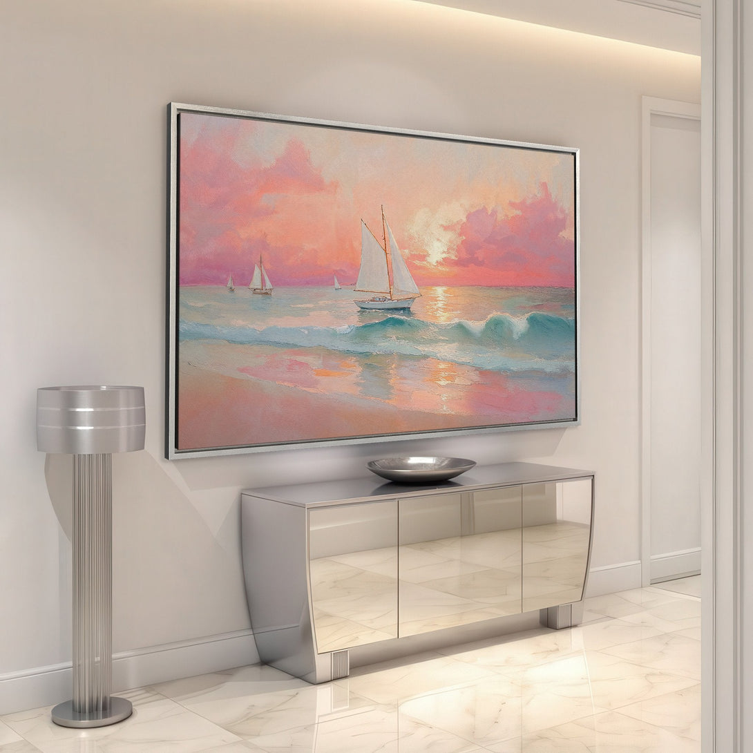 Framed Wall Art: Coastal sunset painting with sailboats in a pink and blue palette. Perfect for adding a touch of serenity to your home decor.