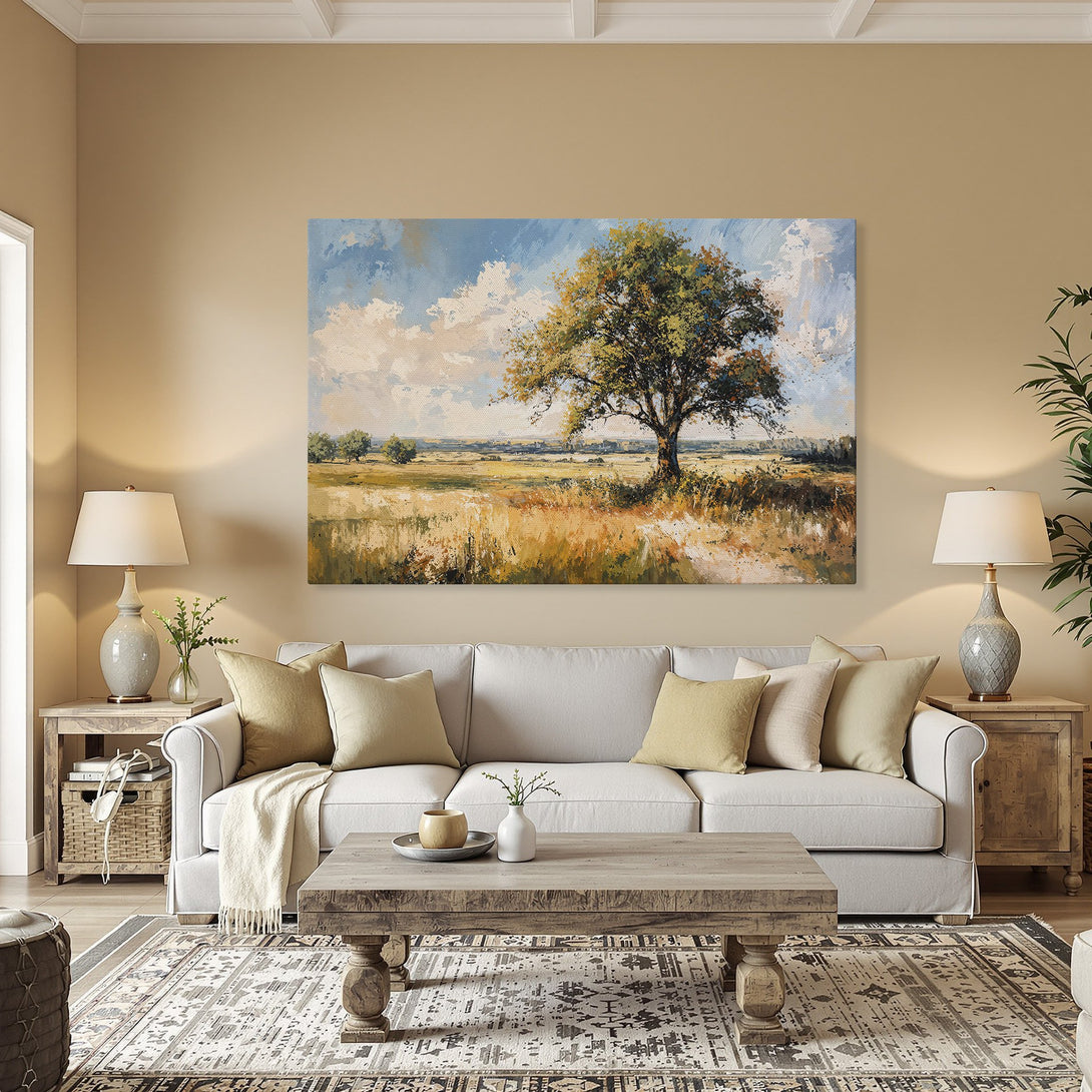 Framed Wall Art featuring a landscape painting of a tree in a field, with warm yellows, greens, and blues. Perfect for adding a touch of nature.