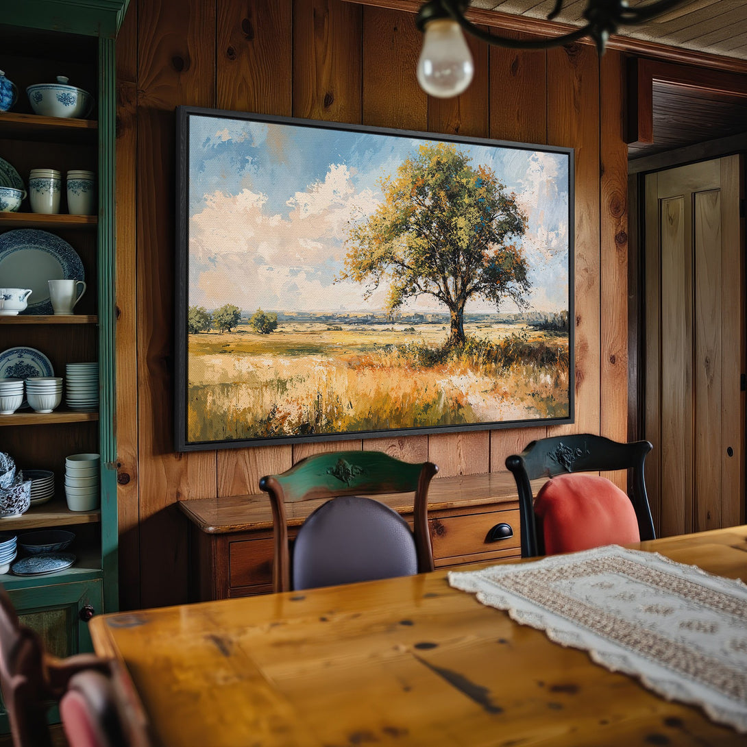 Framed Wall Art: Landscape Canvas Print with tree in a field. Warm earth tones and blue sky create a serene, rustic aesthetic. Perfect for home decor.