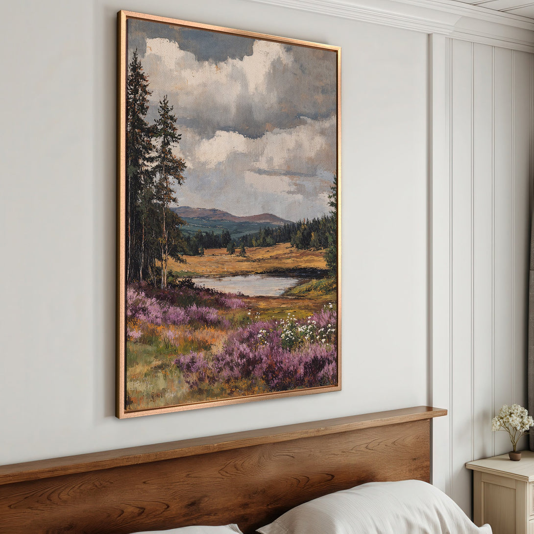 Framed Wall Art: Landscape Canvas Print featuring a serene meadow scene with purple flowers, trees, and a lake. Earthy tones create a calming aesthetic.