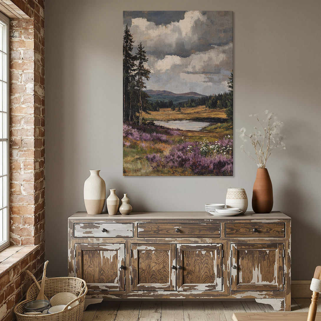 Framed Wall Art: Landscape Canvas Print in a dining room. Features a serene landscape with purple flowers, green trees, and a muted color palette.