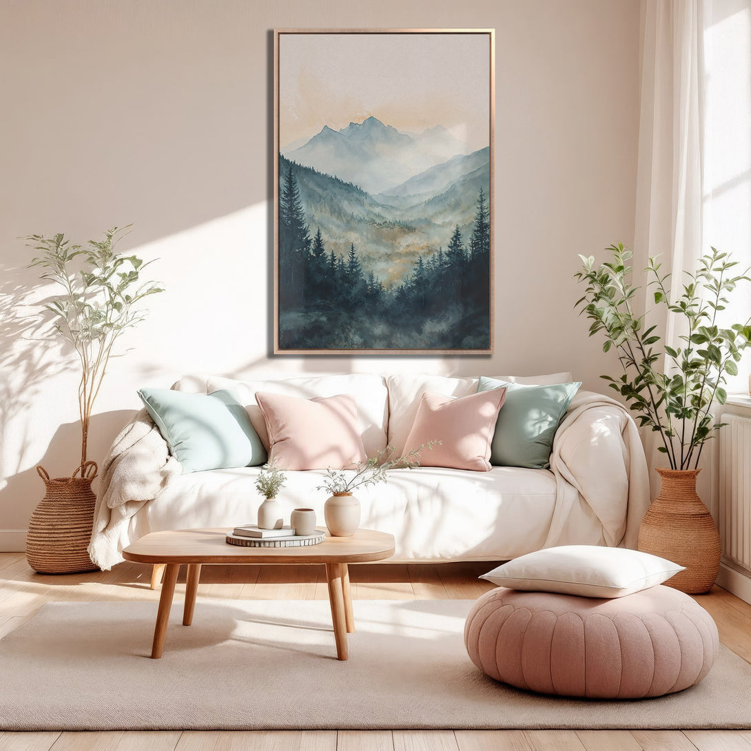 Framed Wall Art featuring a serene mountain landscape in watercolor style. Soft teal and blush pink color palette, perfect for adding a touch of calm to any space.