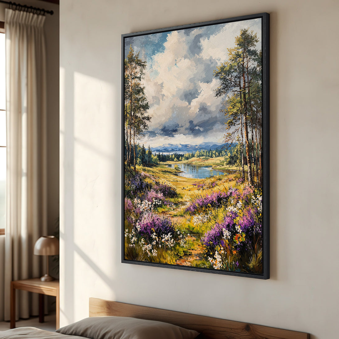 Framed Wall Art: Landscape Canvas Print showcasing a vibrant meadow scene with a lake, trees, and a colorful palette of blues, greens, and purples.