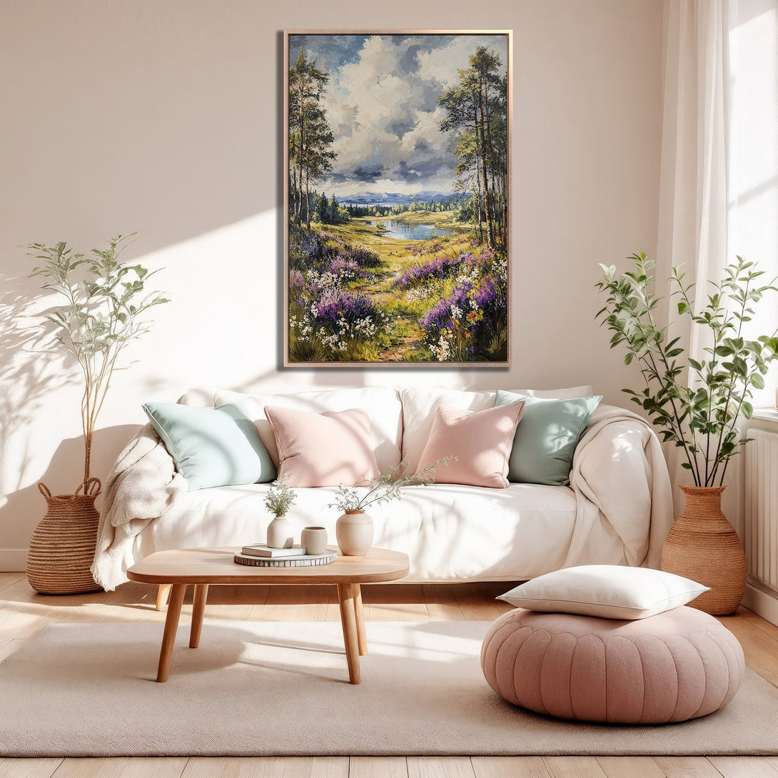 Framed Wall Art: Landscape painting with a soft, impressionistic style. Features a vibrant color palette of greens, purples, and blues, displayed in a cozy living room.