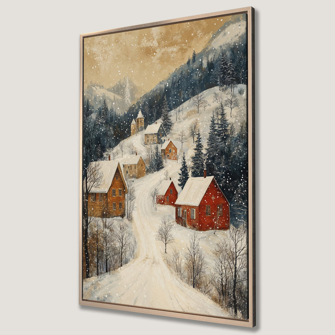 Framed Wall Art of a snowy village scene. Rustic watercolor style with red and brown houses, set against a backdrop of blue-green trees and a warm, golden sky.