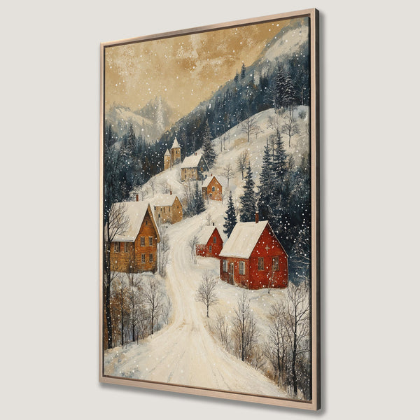 Framed Wall Art of a snowy village scene. Rustic watercolor style with red and brown houses, set against a backdrop of blue-green trees and a warm, golden sky.