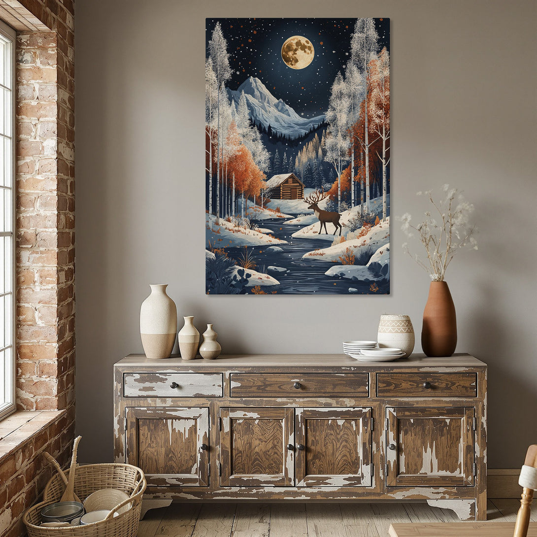 Framed Wall Art: Winter landscape Canvas Print with a cabin, deer, and moon. Features cool blues, warm oranges, and a cozy, inviting style.