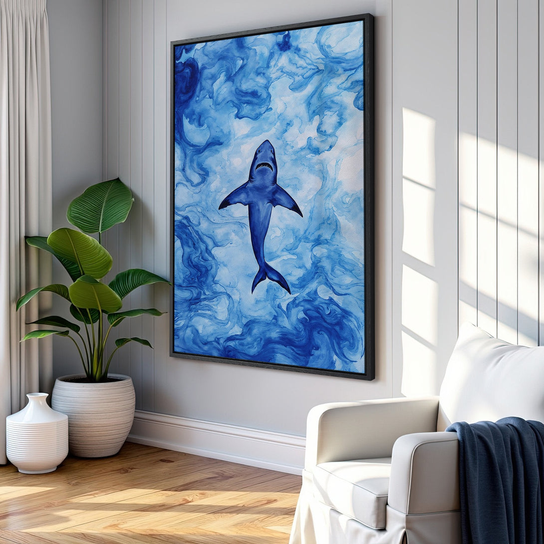 Framed Wall Art featuring a striking blue shark against a watercolor-style background. Coastal-inspired artwork with a calming blue color palette, perfect for any space.