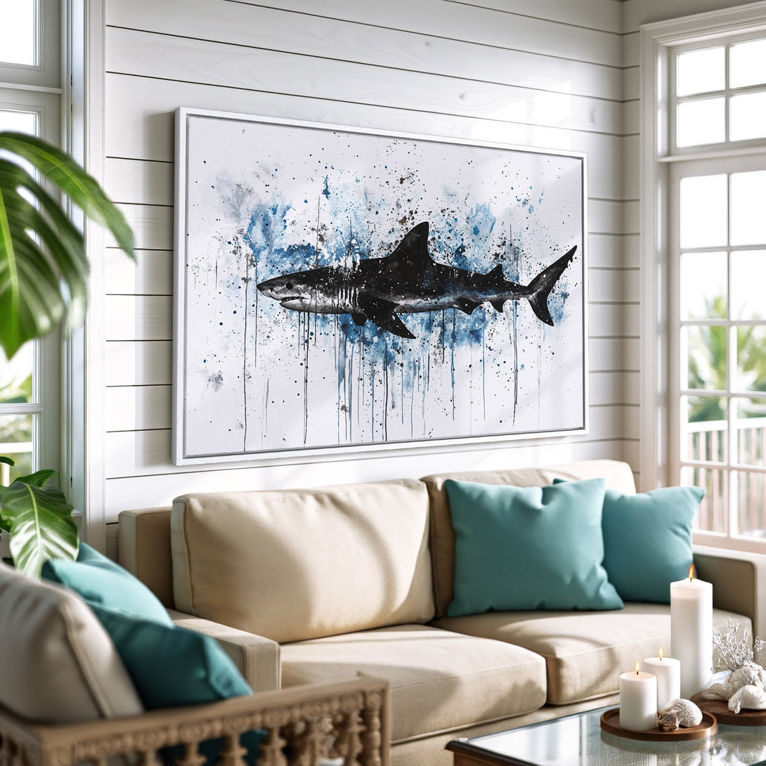 Framed Wall Art: Watercolor shark painting in blue & black. Coastal style canvas print adds a splash of ocean art to your home decor.