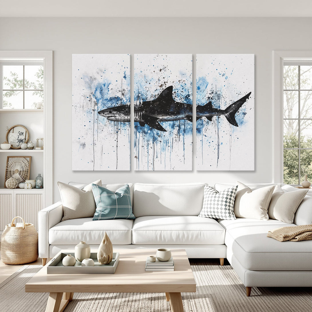 Canvas Print of a watercolor shark in blue and black. Modern coastal wall art for living room decor.