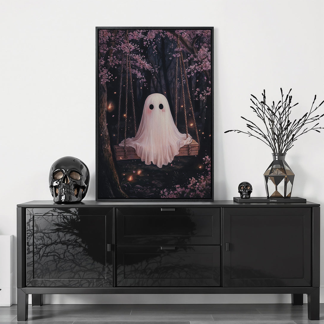 Framed Wall Art featuring a whimsical ghost on a swing in a dark forest with pink blossoms. Moody, romantic art with a dark, ethereal color palette.