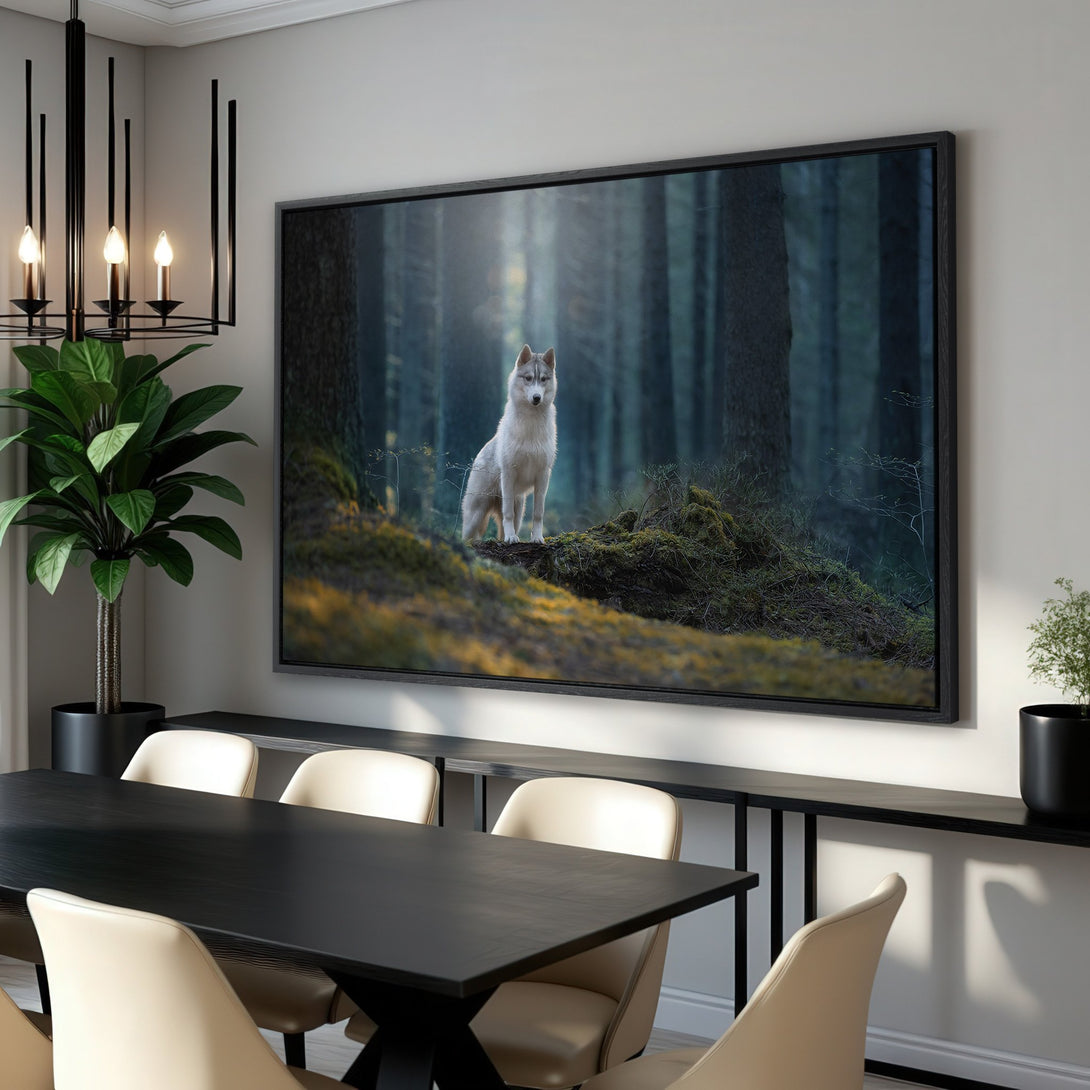 Framed Wall Art featuring a majestic wolf in a forest. Moody, natural style with a cool blue and green color palette. Perfect for any interior.