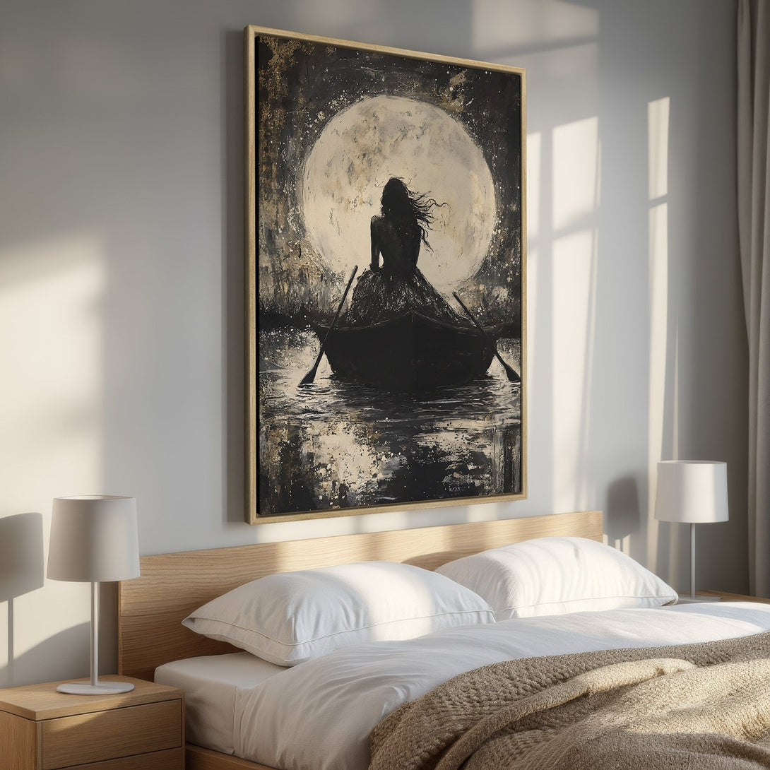 Framed Wall Art: Dramatic black & gold painting of woman in a boat under a moon. Perfect for bedroom decor. Modern, artistic style with neutral color palette.