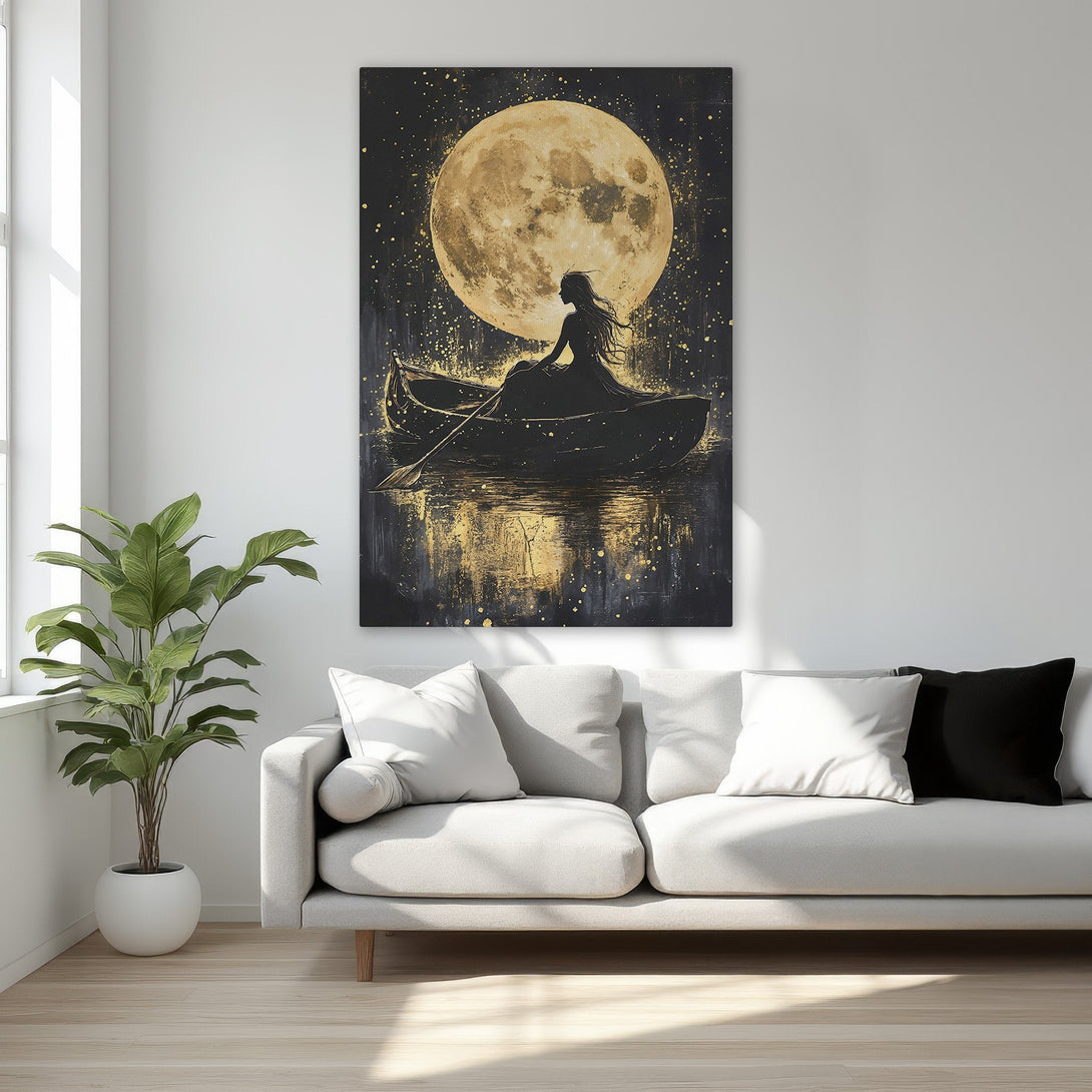 Framed Wall Art featuring a woman in a boat under a golden moon. Dramatic black, gold, and white art adds a touch of elegance to any interior.
