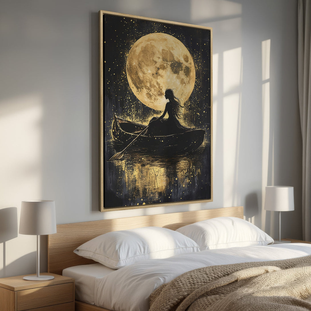 Framed Wall Art: Silhouette of woman in boat under a golden moon. Dramatic, artistic canvas print in black & gold, perfect bedroom decor.