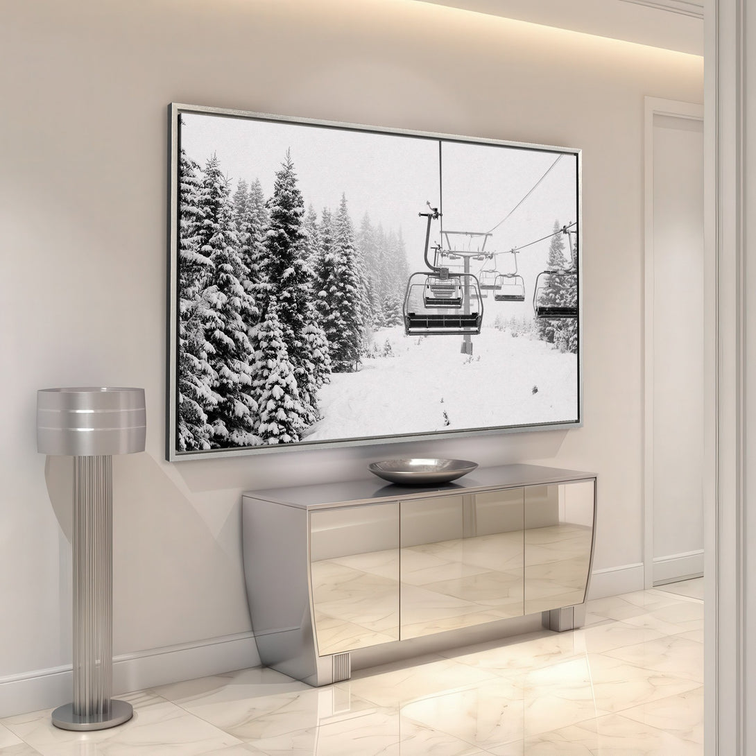Framed Wall Art: Black and white winter scene with ski lift and snow-covered trees. Modern canvas print adds a touch of nature to any interior.