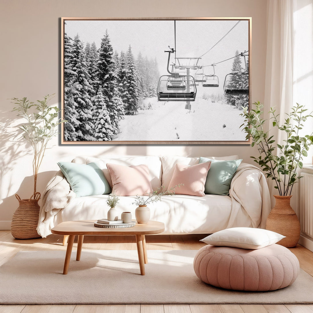 Framed Wall Art featuring a black and white winter scene with ski lift and snow-covered trees. Perfect for adding a touch of nature to your home decor.