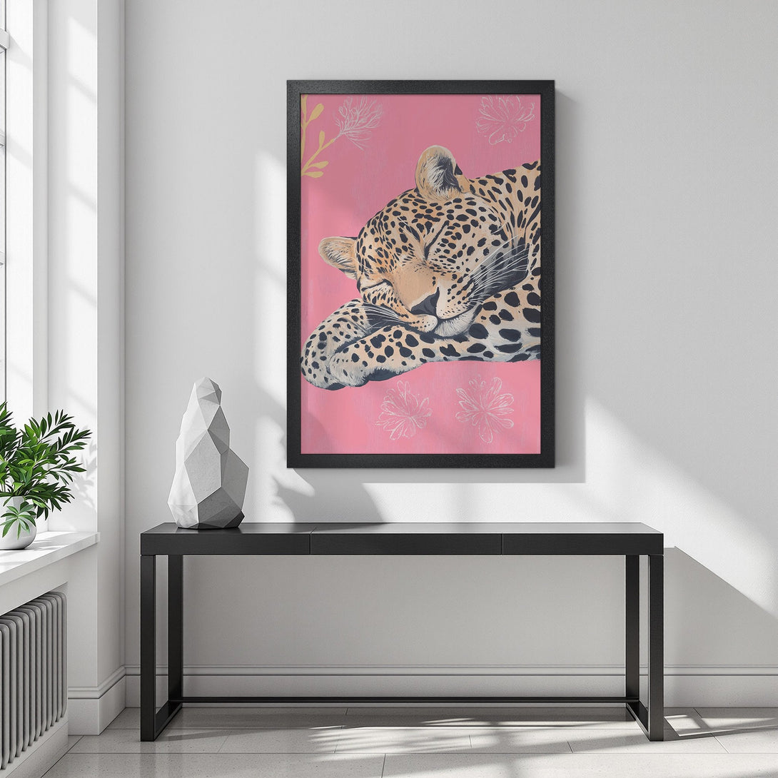 Framed Poster featuring a sleeping leopard with a pink background. Modern art style with a neutral and pink color palette. Perfect wall decor!
