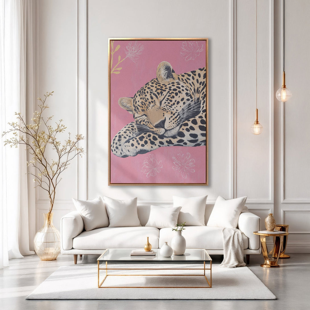 Framed Wall Art: Leopard Canvas Print in a modern interior. Pink, gold, and neutral color palette. Adds a touch of luxury and style.