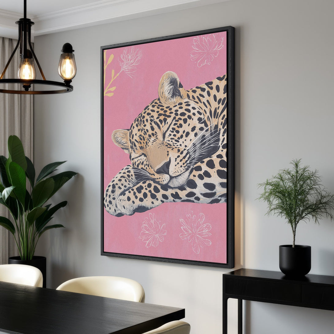 Framed Wall Art: Sleeping leopard on pink background. Modern animal art with a pop of color. Perfect for any home decor style. Shop now!