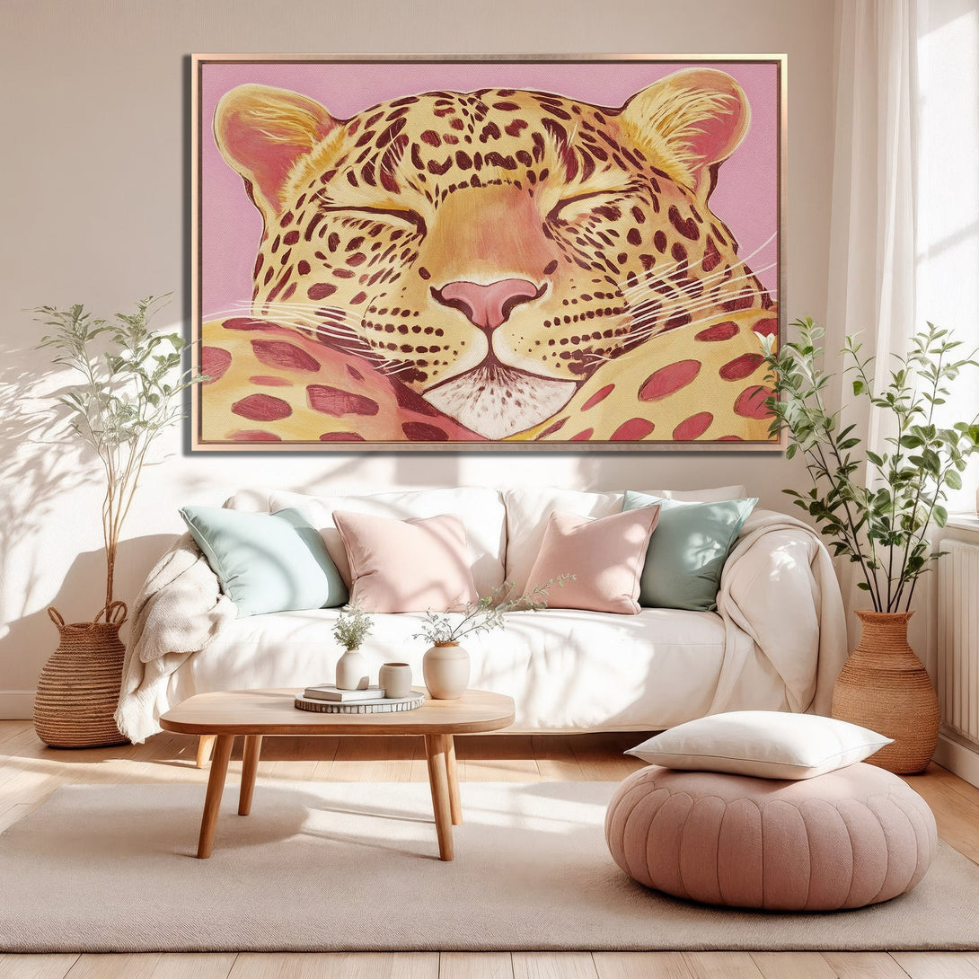 Framed Wall Art: Relaxed leopard portrait in a blush pink, beige, and brown color palette. Perfect for adding a touch of modern art to your home decor.