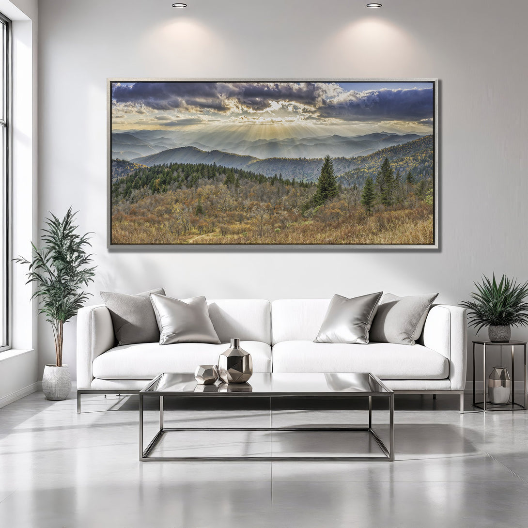 Framed Wall Art: Mountain landscape canvas print with warm, earthy tones. Adds a touch of nature and serenity to your modern living room decor.