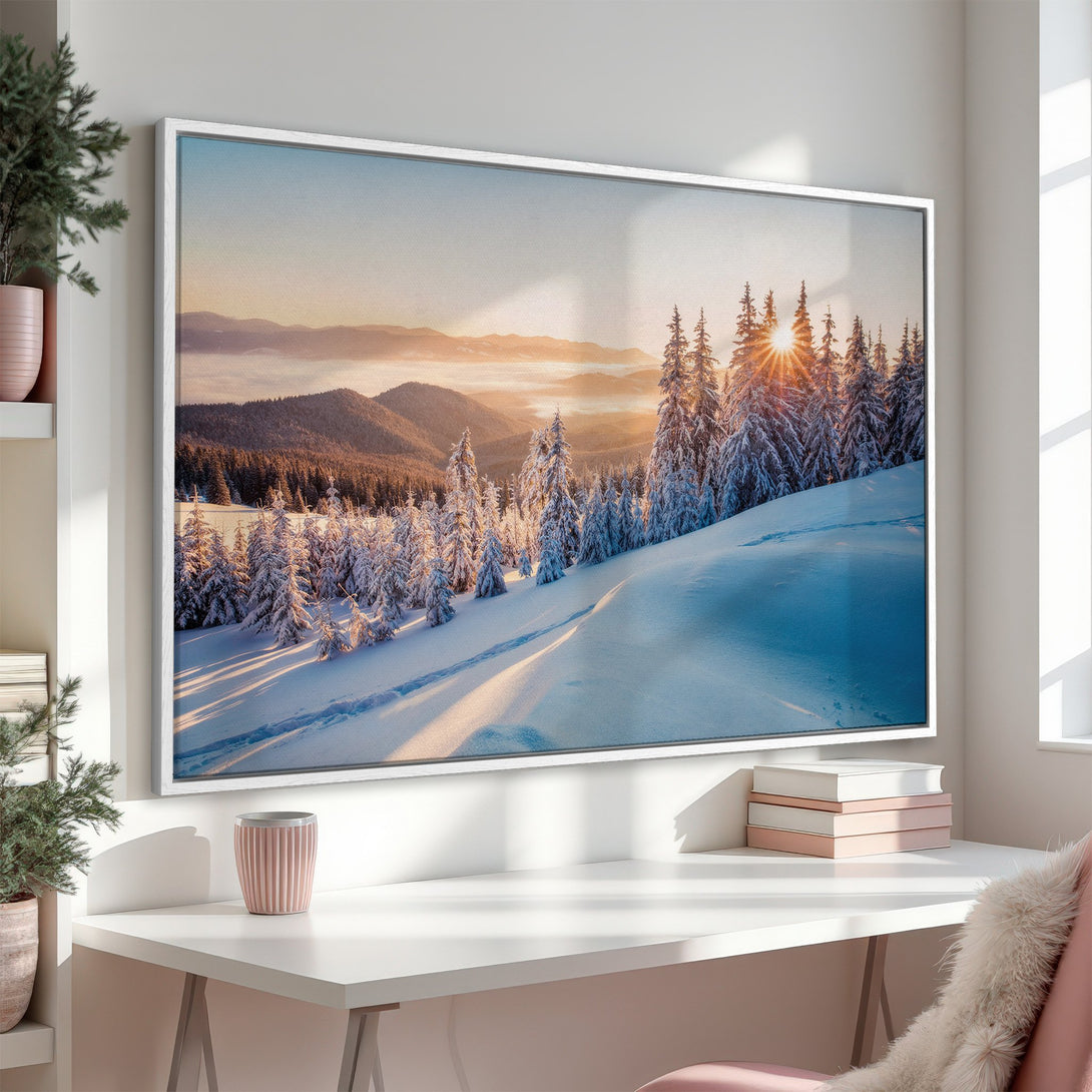 Framed Wall Art: Winter landscape canvas print with snow-covered trees and mountains, featuring a warm color palette. Perfect for home decor.