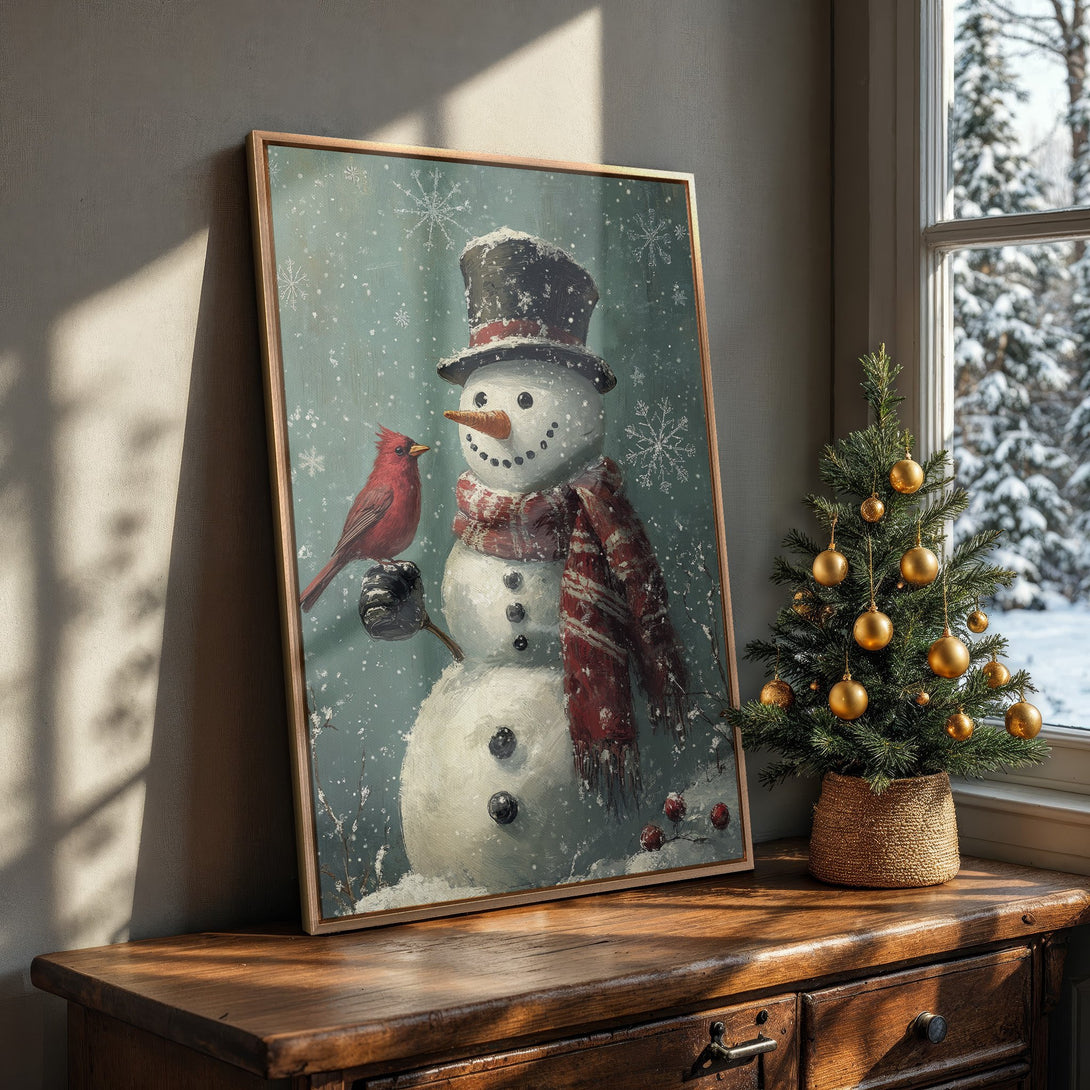 Framed Wall Art: Charming snowman with cardinal art print in a cozy interior. Features a vintage style with a red, white, and teal color palette. Perfect winter decor!