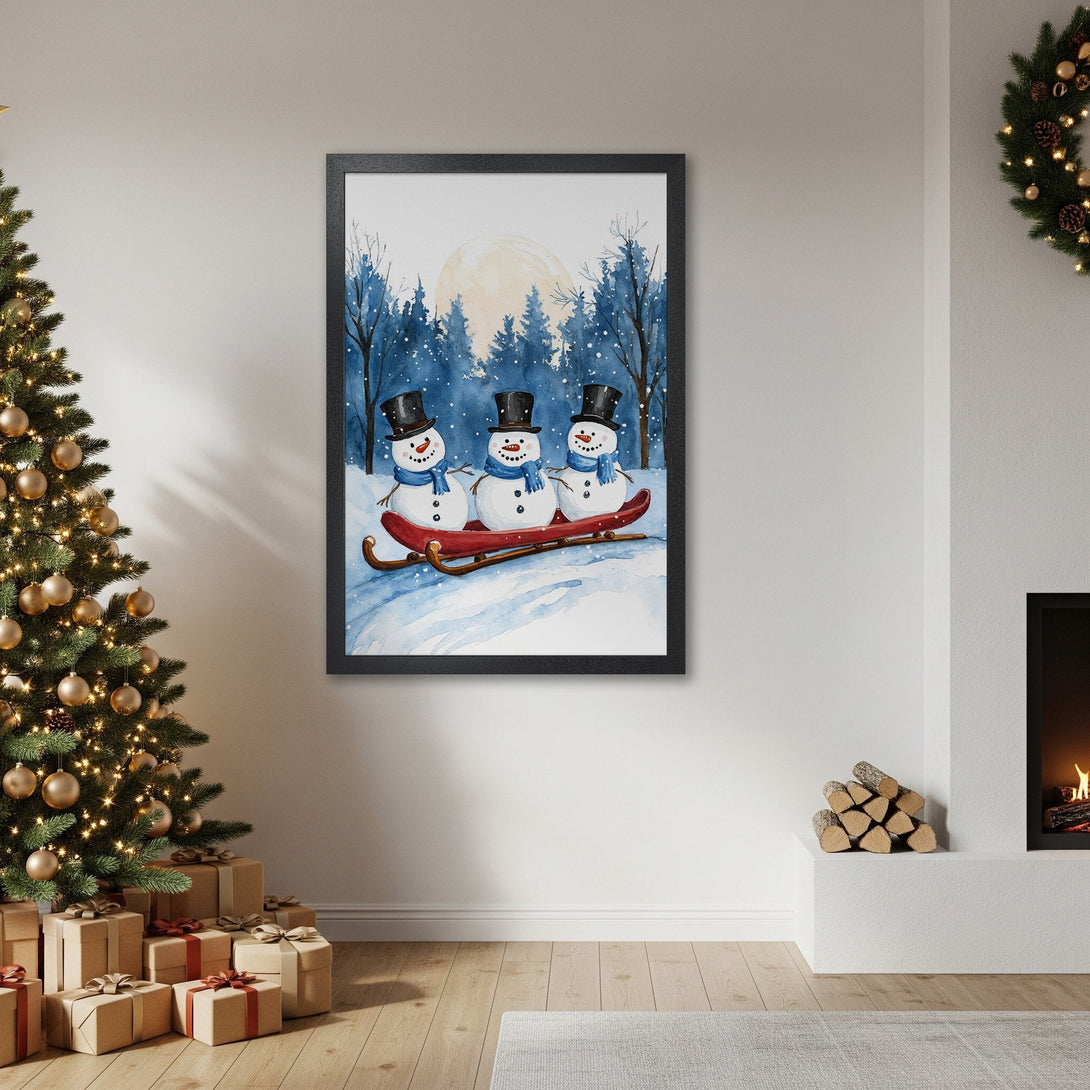 Framed Poster featuring watercolor snowmen on a sled, winter scene in blue and white, perfect Christmas decor.