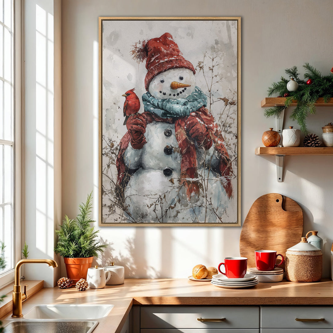 Framed Wall Art: Watercolor snowman with cardinal, showcasing a cozy winter scene in red, blue, and neutral tones. Perfect for holiday decor!