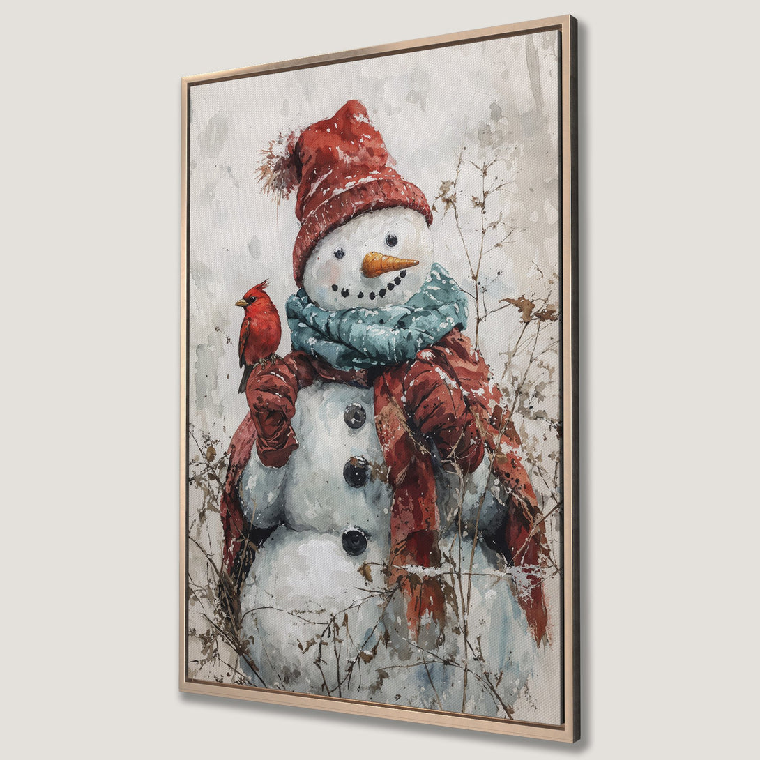 Framed Wall Art featuring a watercolor snowman with a cardinal, in a red, blue, and neutral color palette. Perfect winter decor for your home!