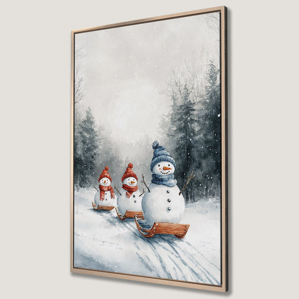 Framed Wall Art: Watercolor winter scene with snowmen sledding. Soft blue, grey, and red palette. Perfect for cozy holiday decor.
