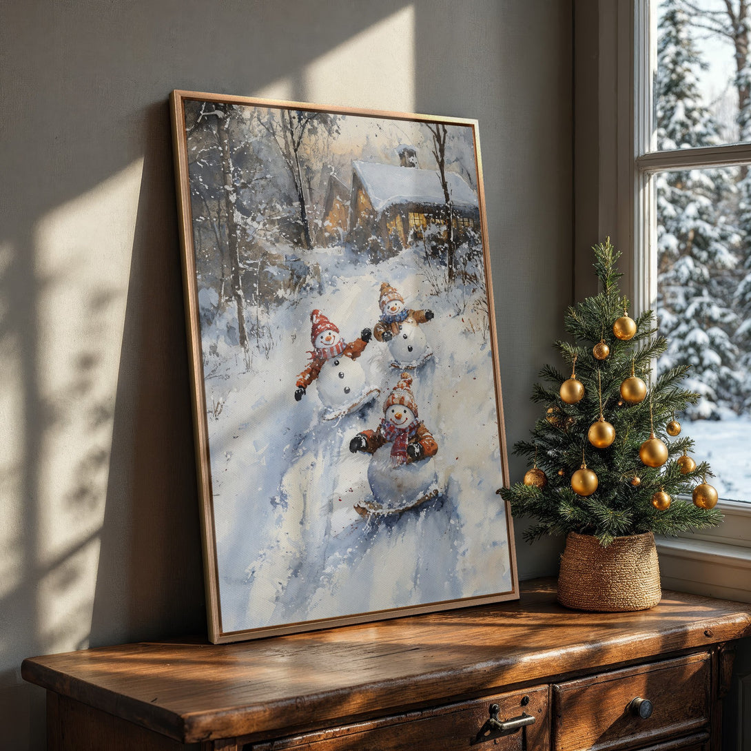 Framed Wall Art: Watercolor painting of snowmen in a winter scene. Warm, inviting color palette with blue, white, and brown tones. Perfect holiday decor.