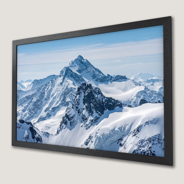Framed Poster of majestic snow-covered mountains in a cool blue and white palette. Perfect wall art!