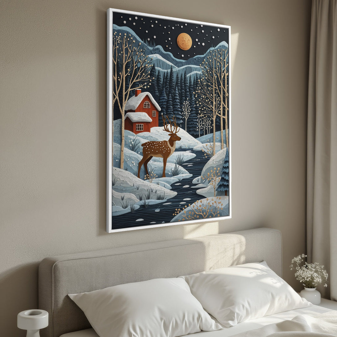 Framed Wall Art: Winter landscape Canvas Print with deer, cabin, and moon in a serene, blue and gold color palette. Perfect for cozy home decor.