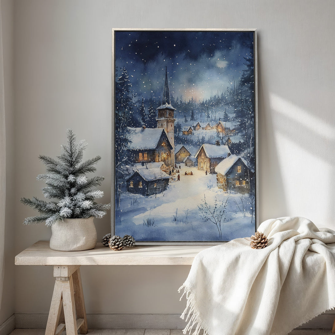 Framed Wall Art: Watercolor winter village scene in blue hues. Cozy, serene artwork for your home. Perfect for adding a touch of winter charm.