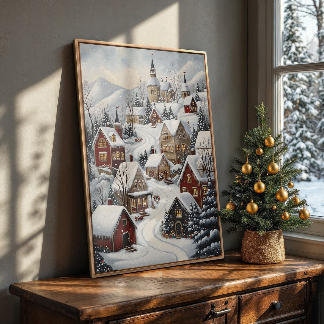 Framed Wall Art featuring a charming winter village scene. Cozy, rustic style with a warm red, brown, and white color palette. Perfect for adding holiday cheer!