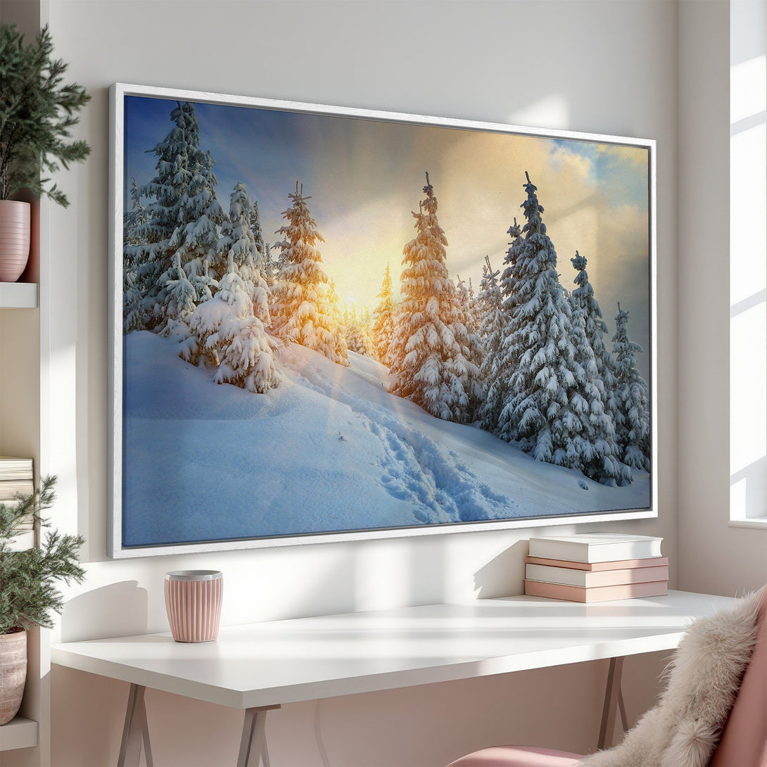 Framed Wall Art: Winter landscape Canvas Print. Snowy trees and sunlit sky in a serene, blue and gold color palette, perfect for home decor.