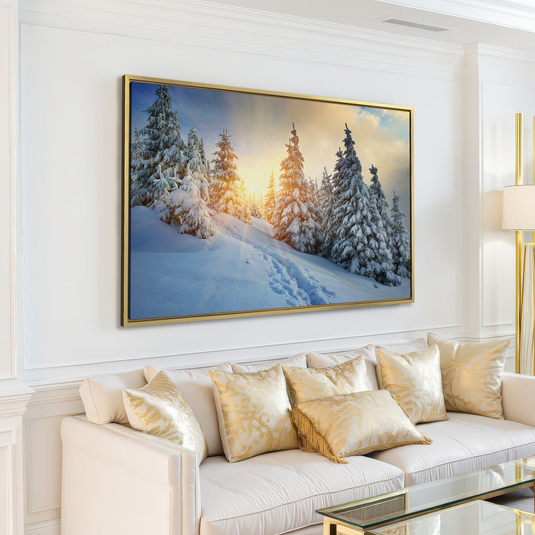 Canvas Print of a snowy winter landscape with pine trees, featuring a serene blue and gold color palette, perfect for home decor.