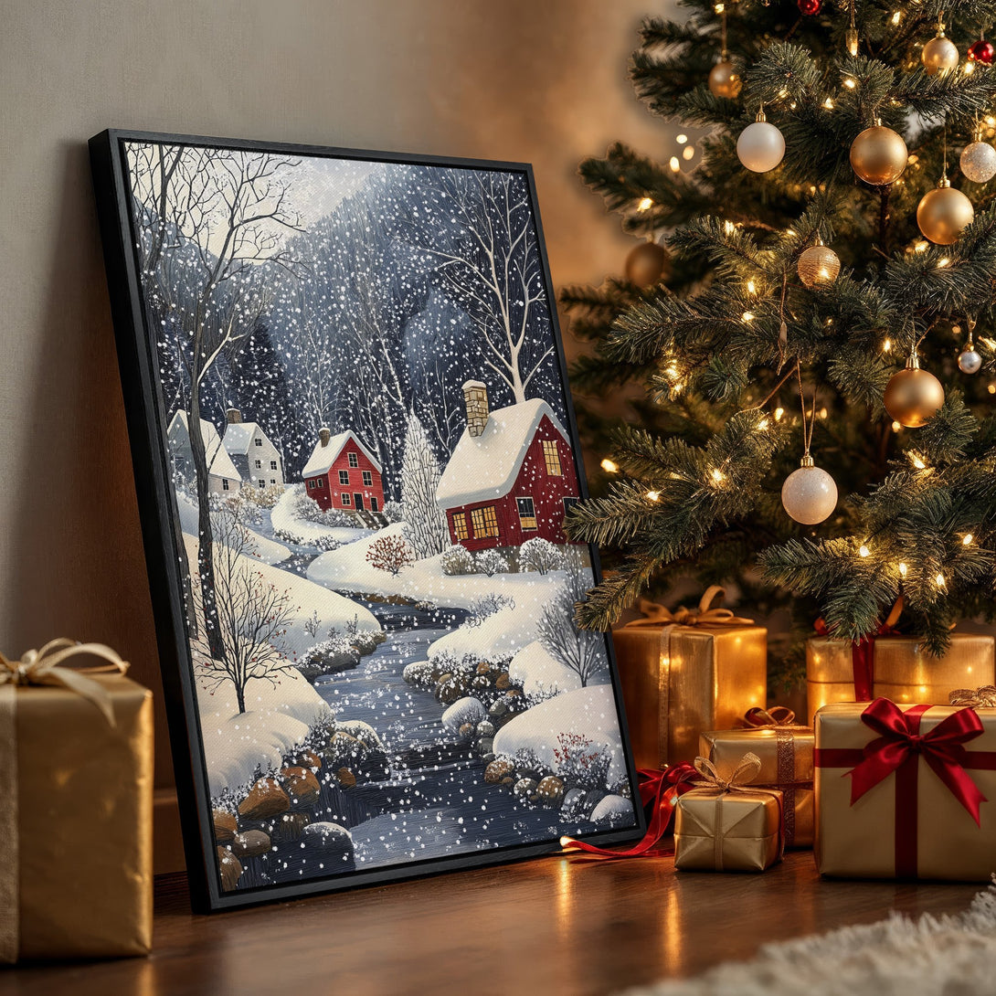 Framed Wall Art: Winter landscape Canvas Print with red houses, snowy trees, and a river. Cozy, inviting art with a blue, white, and red color palette.