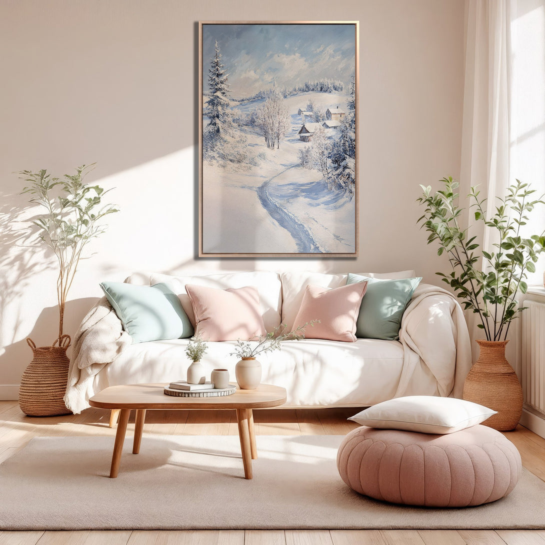 Framed Wall Art: Winter landscape canvas print in a cozy living room. Features a snowy scene with blue, white, and natural tones. Perfect for adding warmth and style.