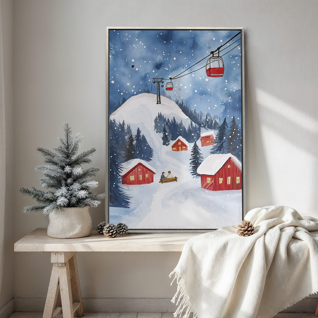 Framed Wall Art: Watercolor winter scene with red cabins, ski lift, and snowy mountain. Blue and white color palette, perfect for cozy home decor.