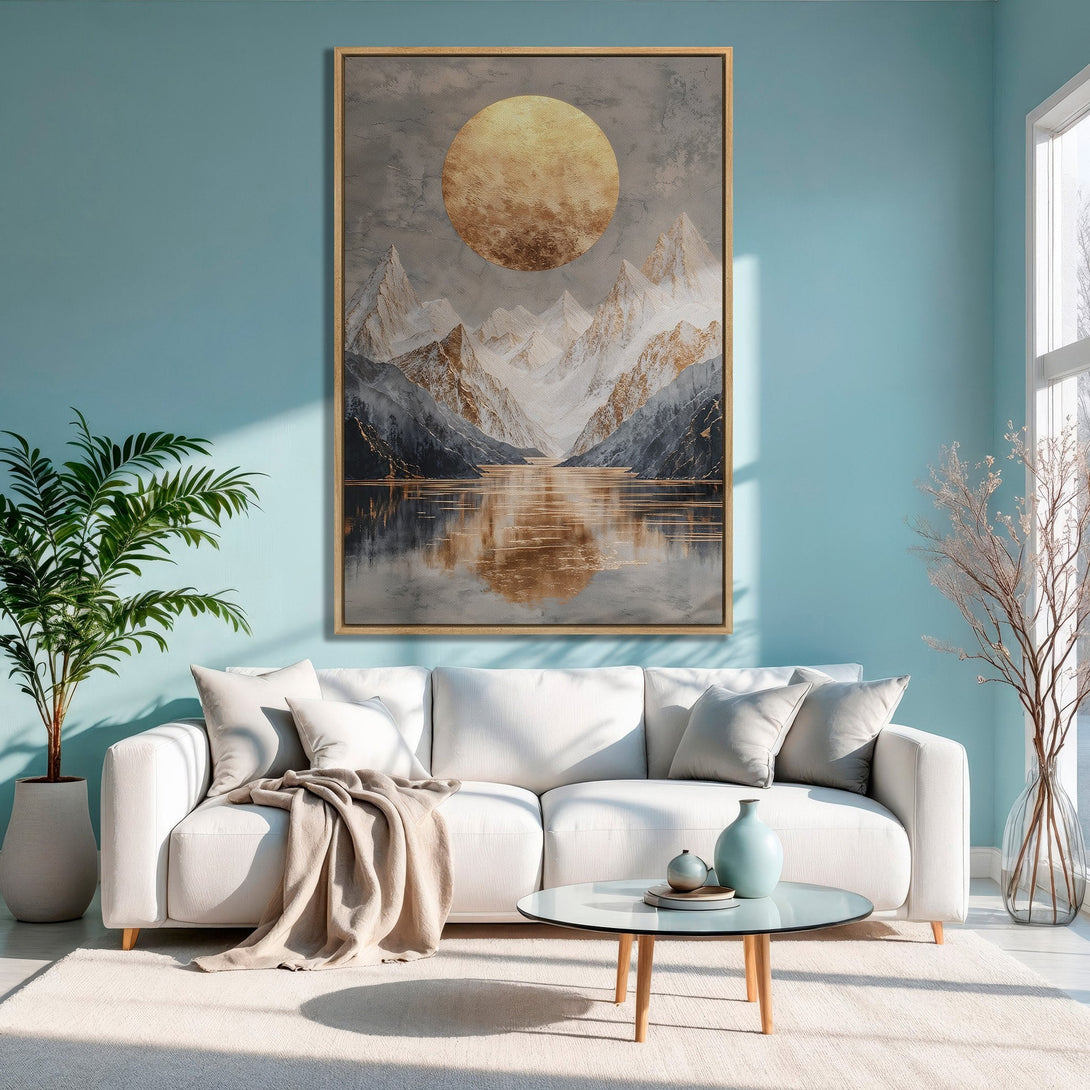 Framed Wall Art: Abstract mountain landscape in gold and gray tones, displayed in a modern living room with a cool blue color palette. Elevate your space!