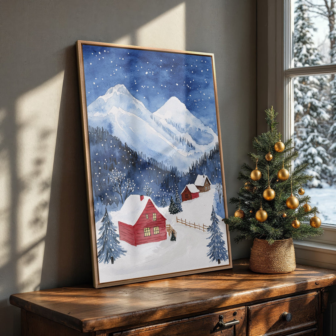 Framed Wall Art: Watercolor winter landscape with red cabins and snowy mountains. Blue and white color palette. Perfect for cozy home decor.