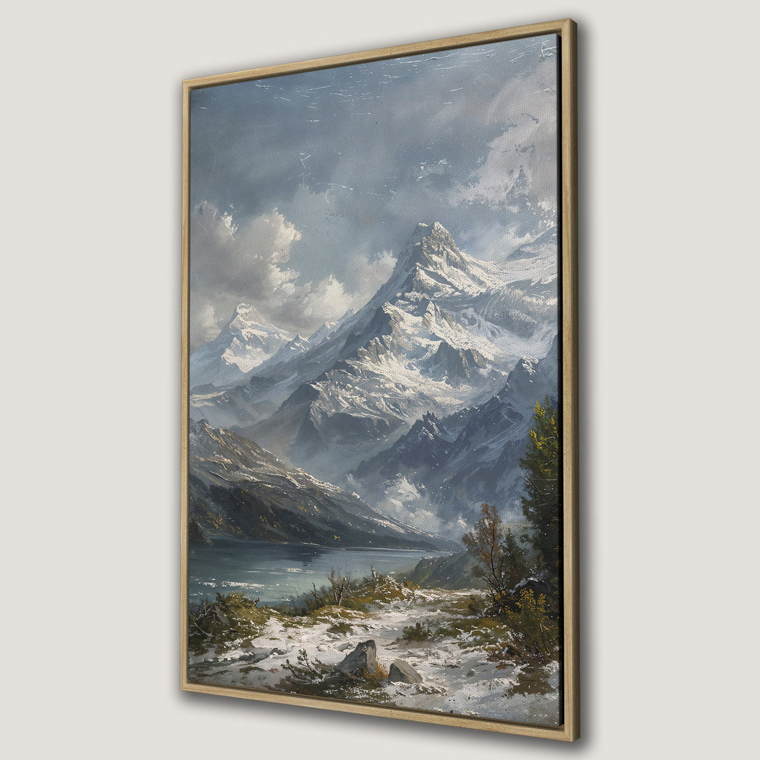 Framed Wall Art: Stunning mountain landscape canvas print in a classic style. Features a serene lake and snowy peaks, with a cool, muted color palette.